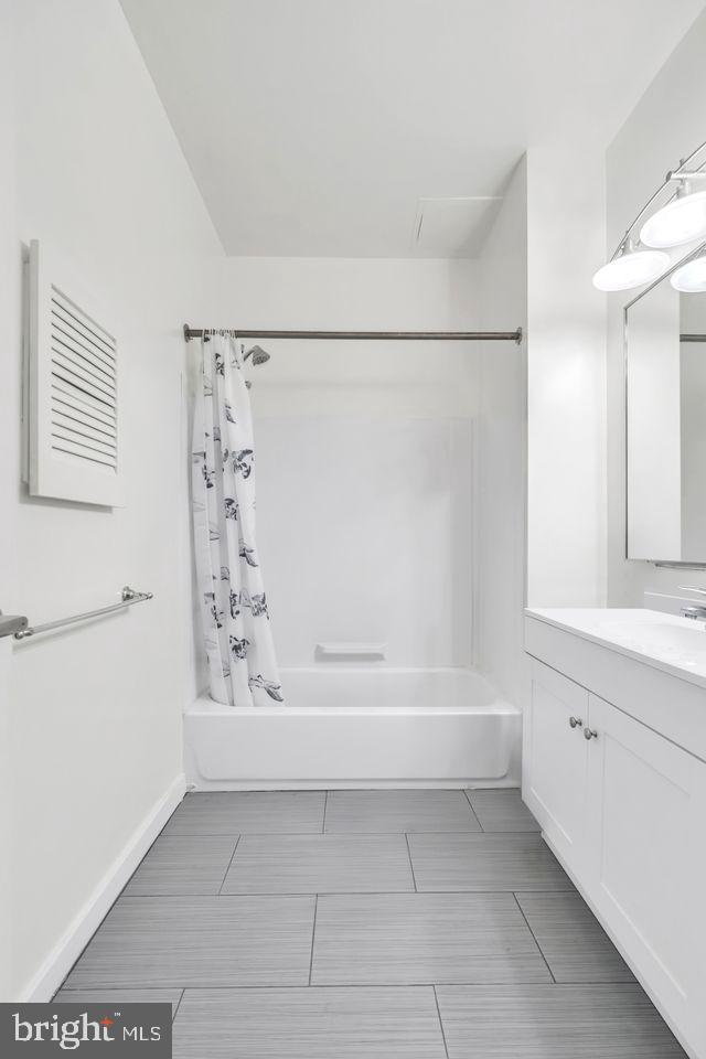 111 North 9th Street, Unit 707 Philadelphia, PA 19107 - Photo 6 of 20 a bathroom with a bathtub and a shower