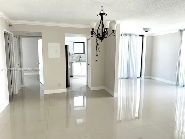 a view of a bathroom with a glass door shower