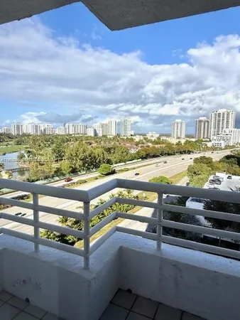 a view of swimming pool from a balcony