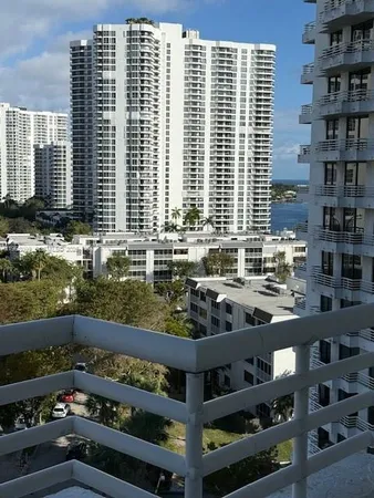 a view of open kitchen with granite countertop