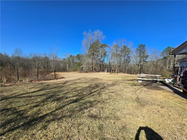 a view of the road and trees