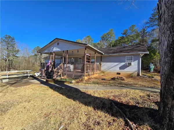 a view of a tiny house with swimming pool