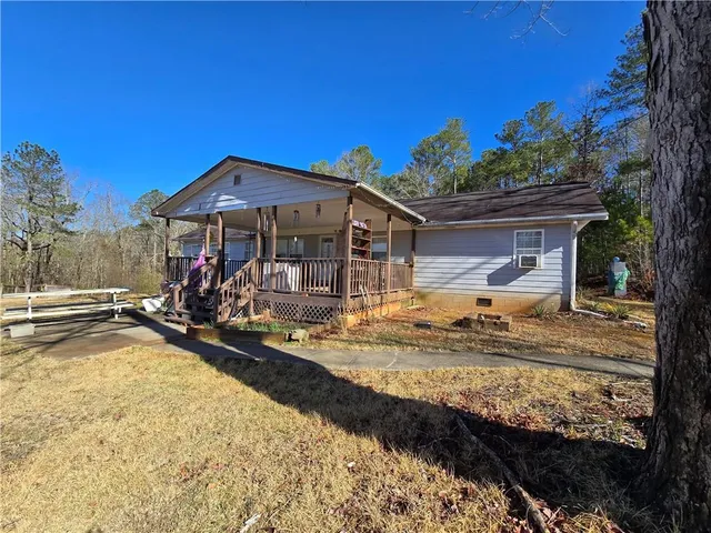 a view of a tiny house with swimming pool