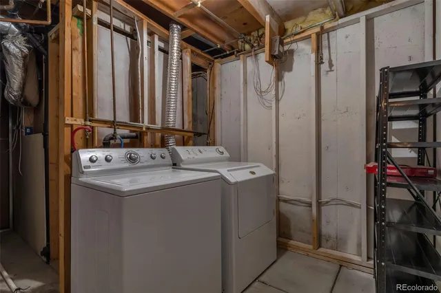 a balcony with view of trees in the background
