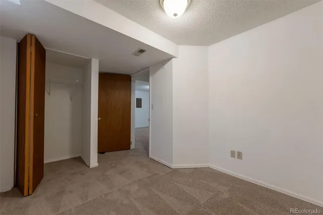 an empty room with closet