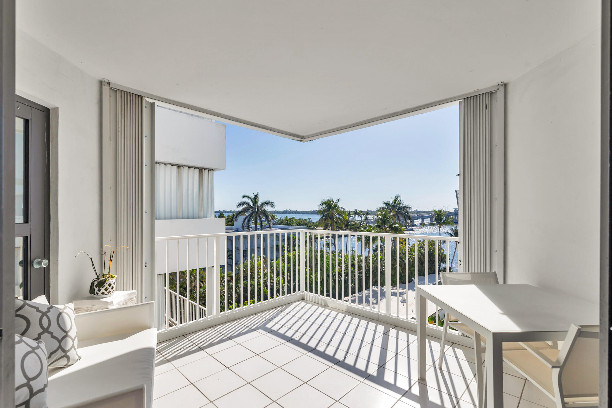 2860 South Ocean Boulevard, Unit 511 Palm Beach, FL 33480 - Photo 14 of 22 a view of a balcony with wooden floor