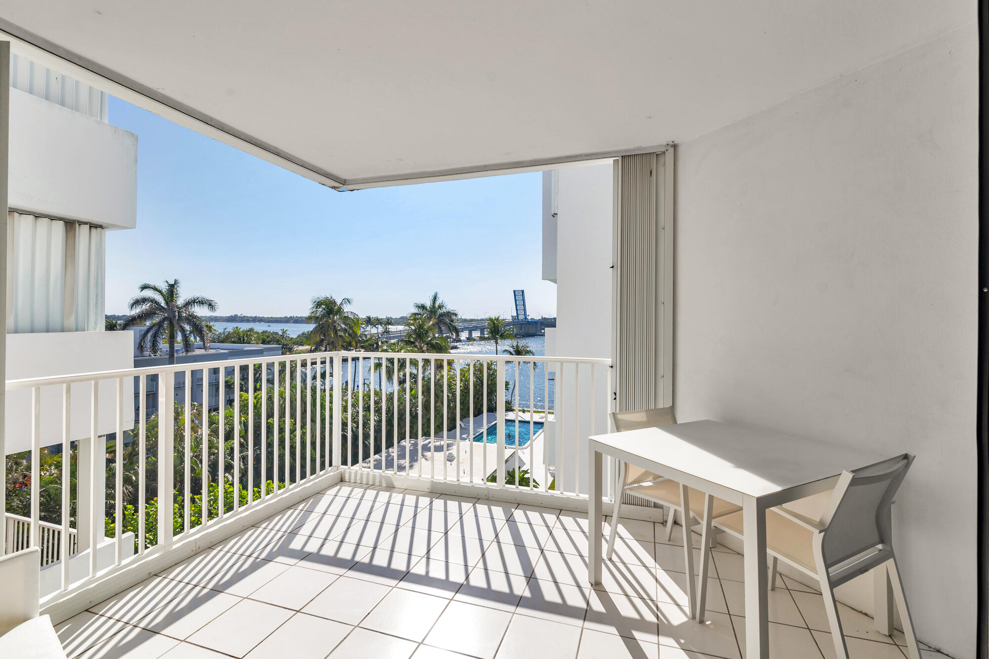 2860 South Ocean Boulevard, Unit 511 Palm Beach, FL 33480 - Photo 15 of 22 a balcony with wooden floor
