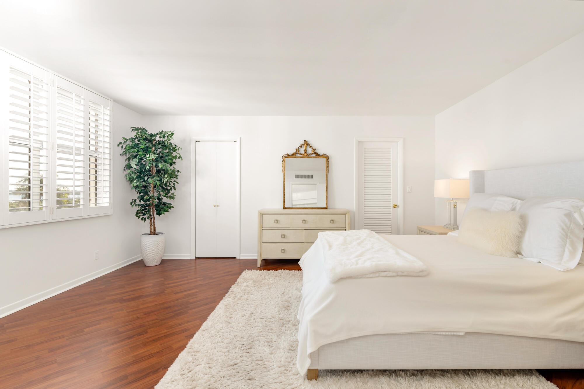 2860 South Ocean Boulevard, Unit 511 Palm Beach, FL 33480 - Photo 10 of 22 a large white bed in a white room