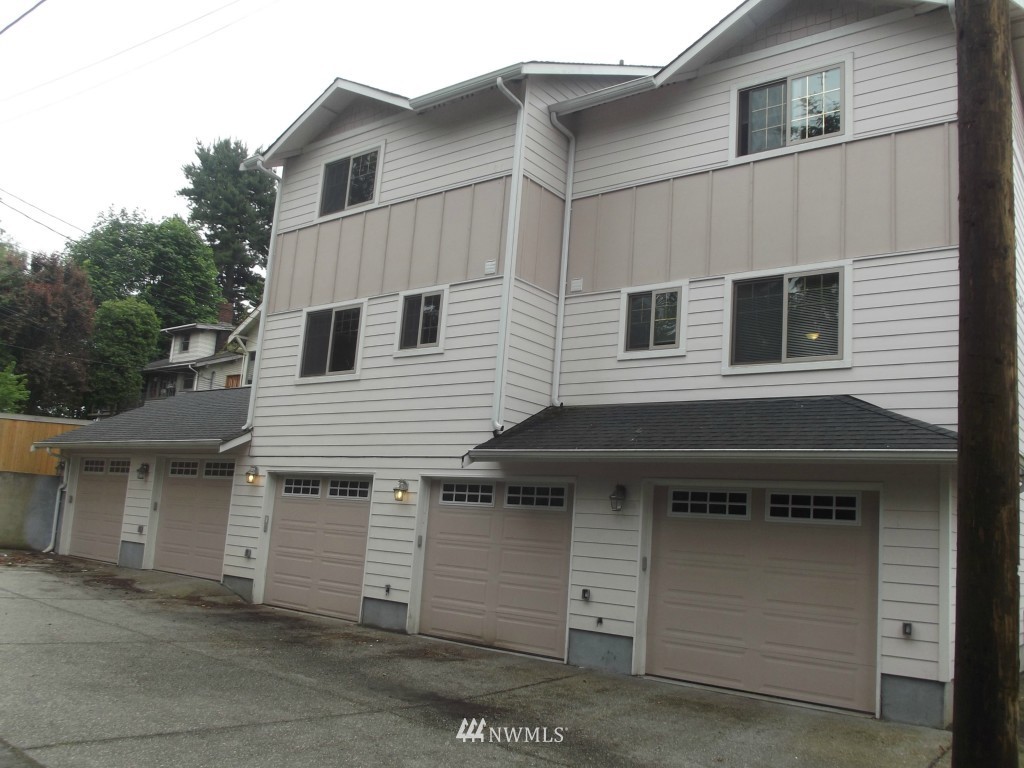 3725 Rockefeller Avenue Everett, WA 98201 - Photo 1 of 24 a front view of a house with a garage