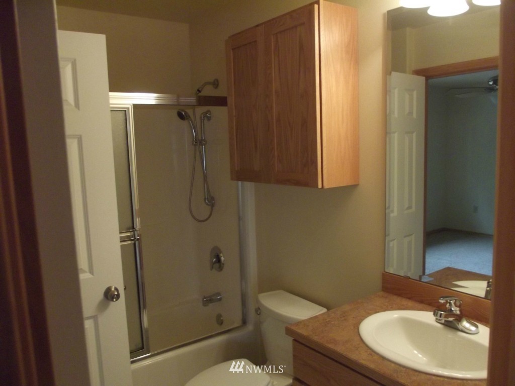 3725 Rockefeller Avenue Everett, WA 98201 - Photo 14 of 24 a bathroom with a sink toilet and shower