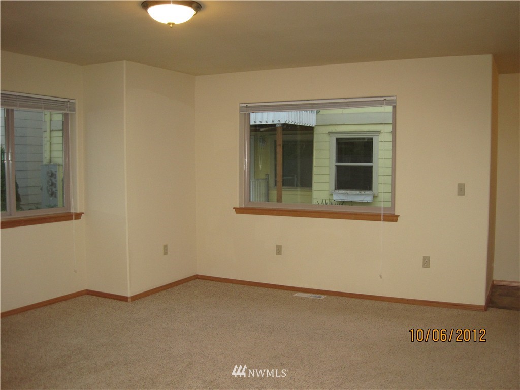 3725 Rockefeller Avenue Everett, WA 98201 - Photo 20 of 24 a view of an empty room with a window