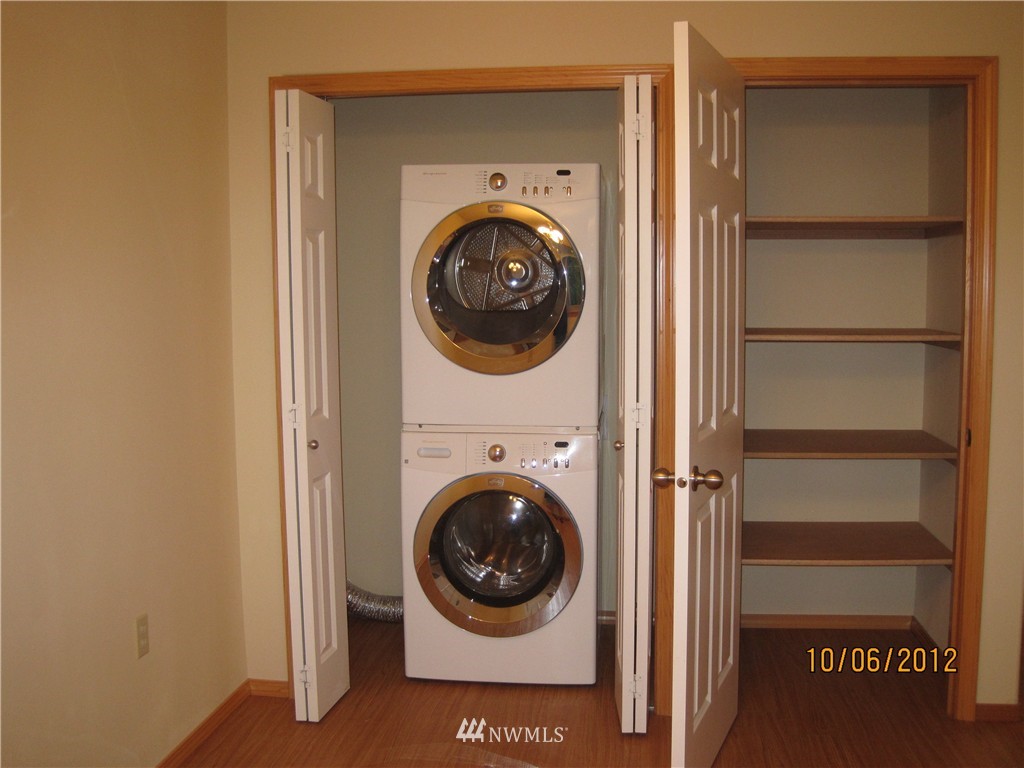 3725 Rockefeller Avenue Everett, WA 98201 - Photo 23 of 24 a view of a hallway with washer and dryer