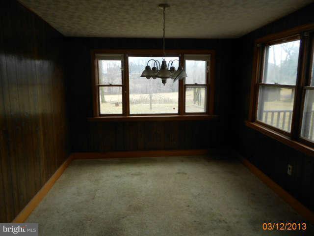 1555 Fairmount Road Hampstead, MD 21074 - Photo 11 of 23 a view of an empty room with a window