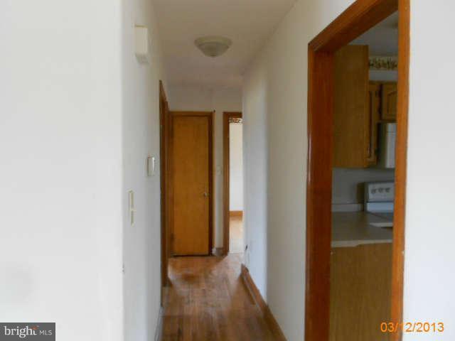 1555 Fairmount Road Hampstead, MD 21074 - Photo 12 of 23 a view of a hallway with wooden floor