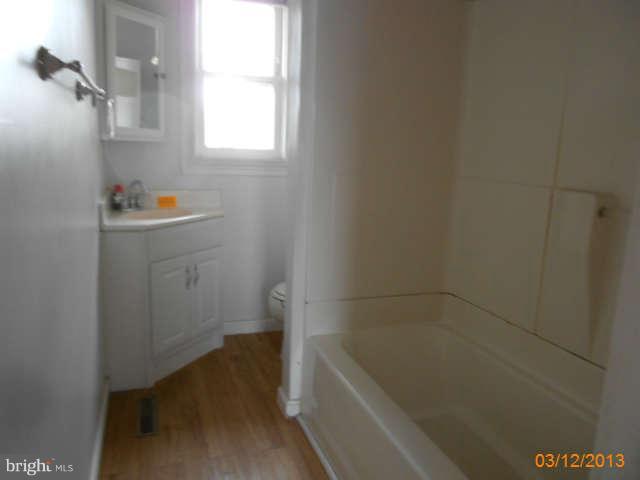 1555 Fairmount Road Hampstead, MD 21074 - Photo 16 of 23 a bathroom with a bathtub sink and toilet