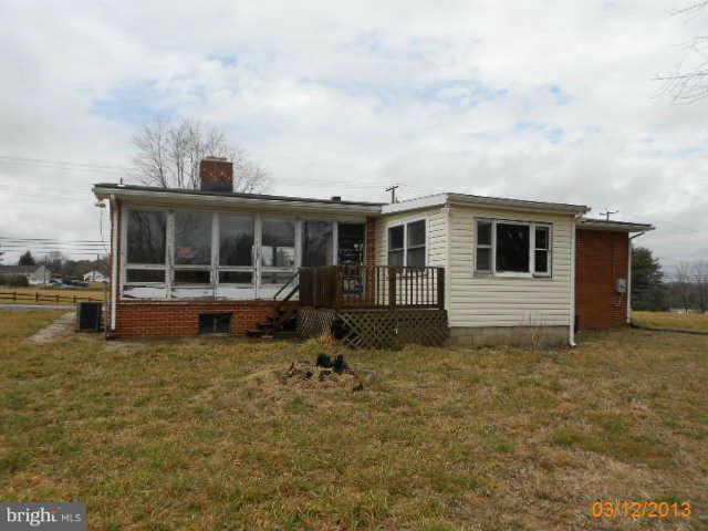 1555 Fairmount Road Hampstead, MD 21074 - Photo 3 of 23 a view of a house with backyard sitting area and garden