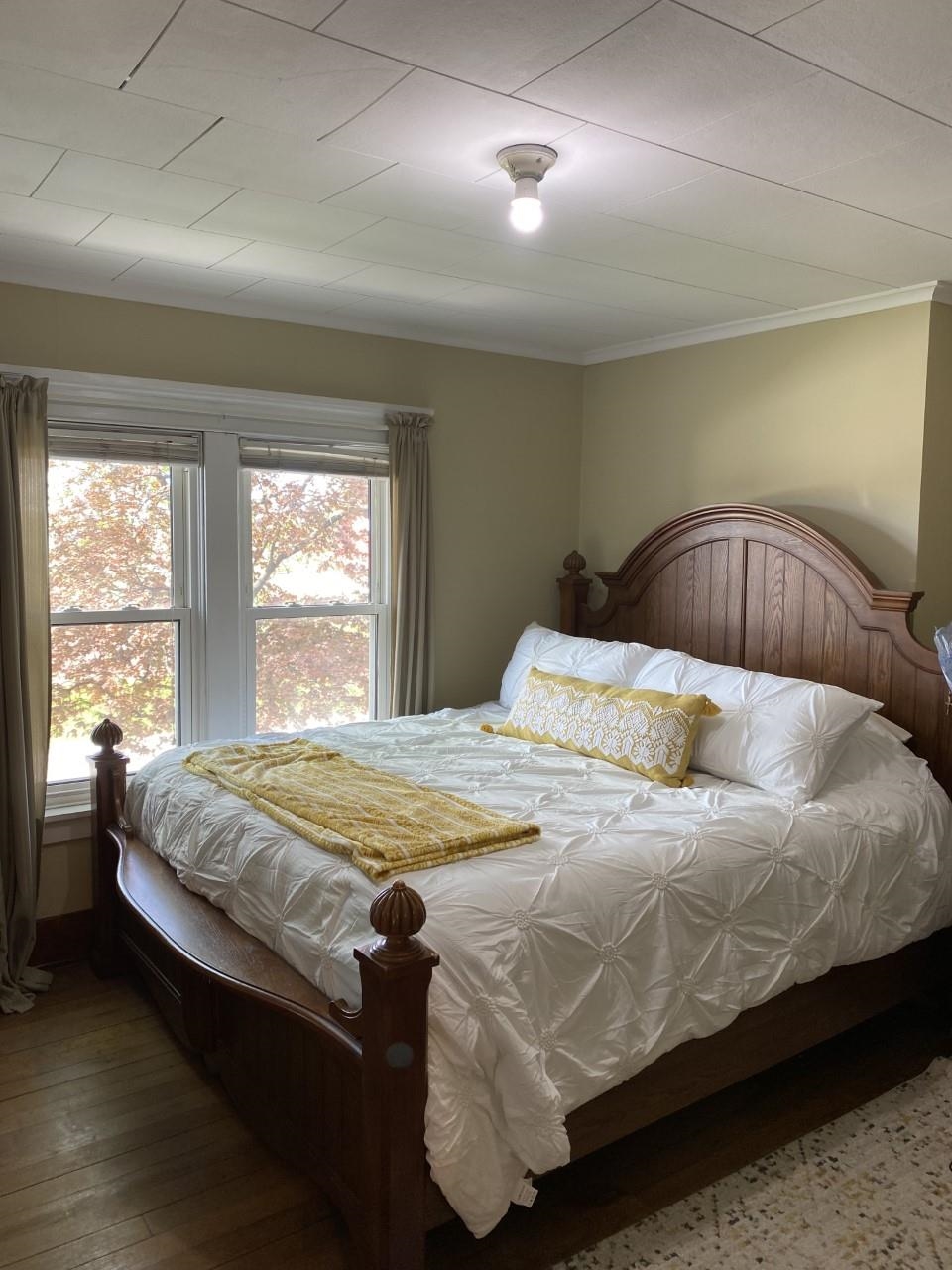 6565 Graden Prairie Rd Garden Prairie Garden Prairie, IL 61038 - Photo 15 of 19 a bedroom with a bed and window