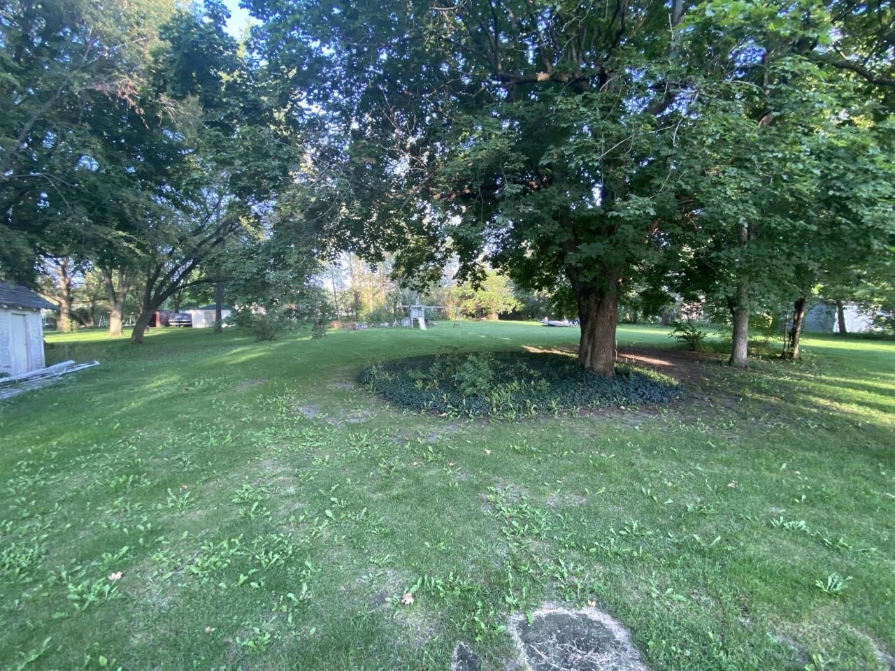 6565 Graden Prairie Rd Garden Prairie Garden Prairie, IL 61038 - Photo 4 of 19 a view of a park with large trees