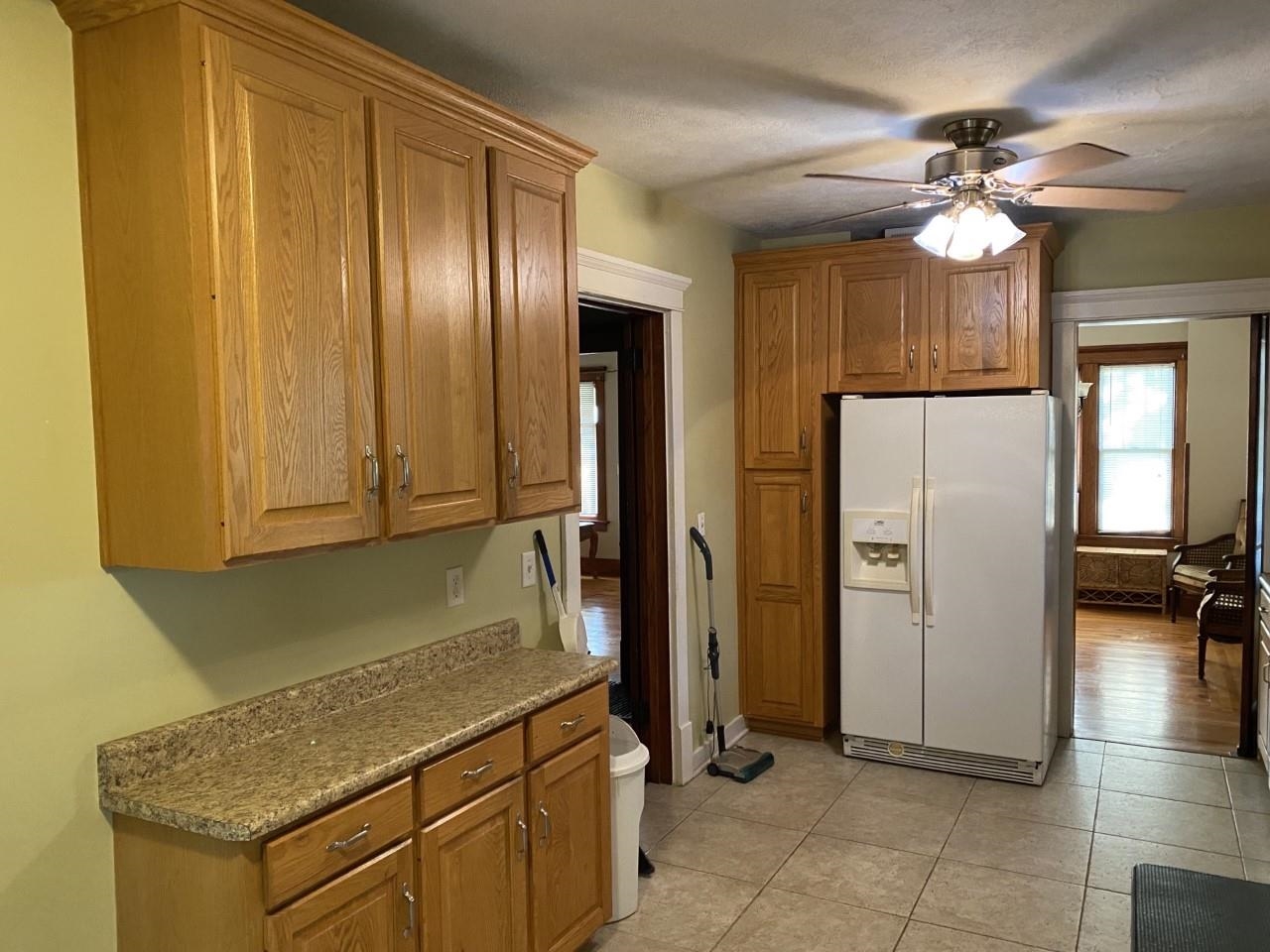 6565 Graden Prairie Rd Garden Prairie Garden Prairie, IL 61038 - Photo 7 of 19 a kitchen with stainless steel appliances granite countertop a refrigerator and a sink