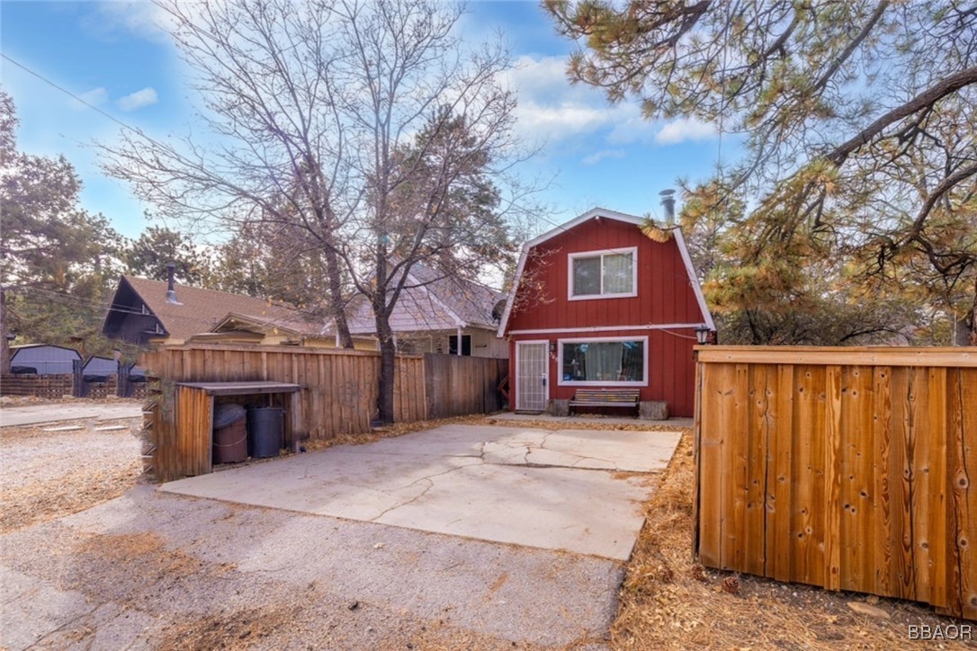 548 Riverside Avenue Sugarloaf, CA 92386 - Photo 3 of 37 a view of a house with a yard