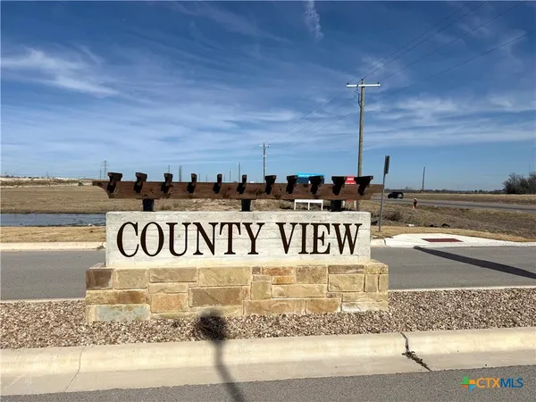 a view of a street with a building