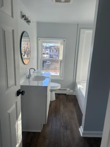 a view of a hallway with elevator