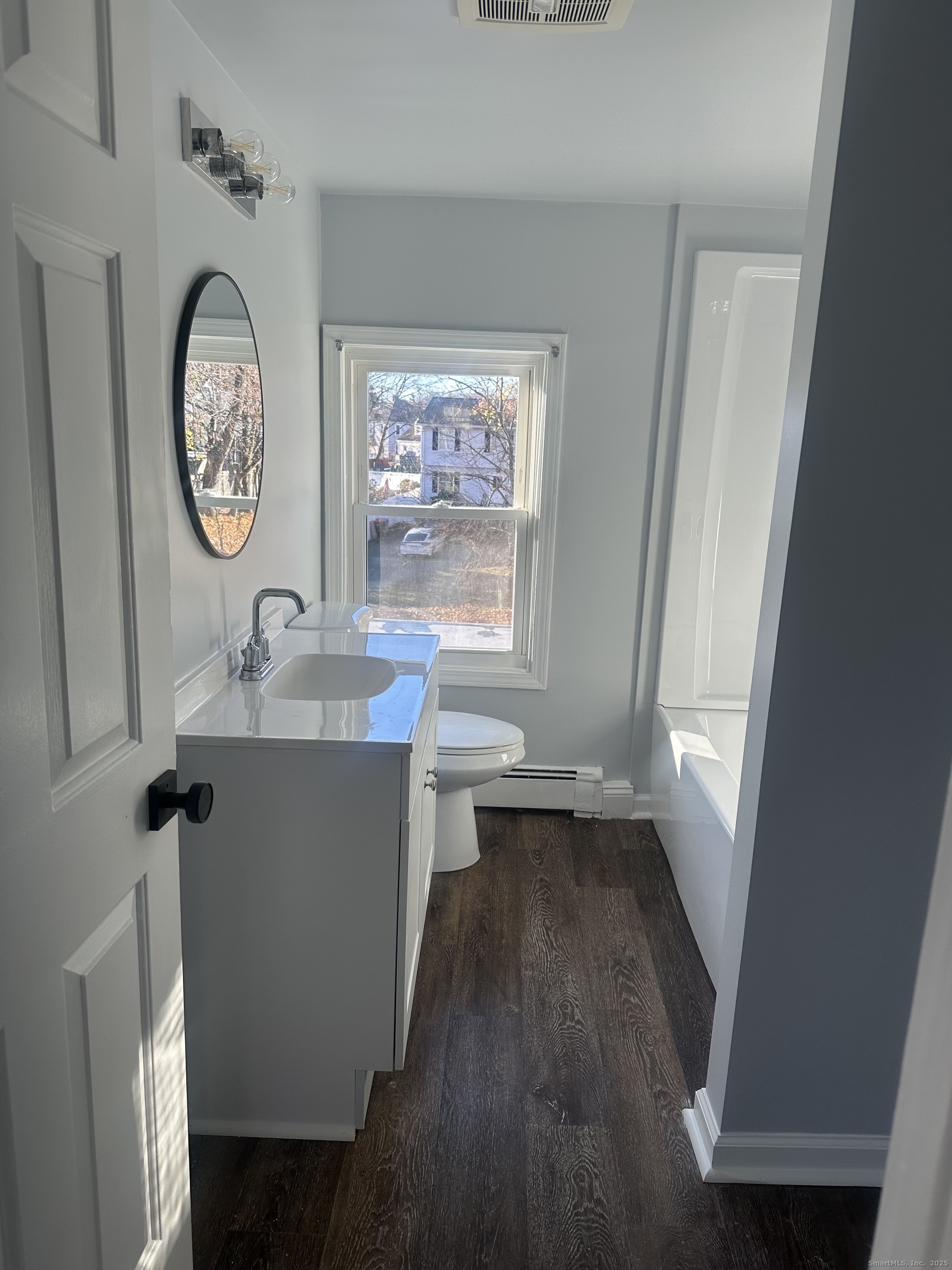 75 Broad Street, Unit 2 Norwalk, CT 06850 - Photo 9 of 10 a view of a hallway with elevator