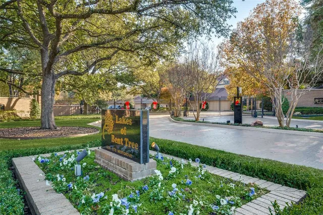 a view of a porch with a table and chairs