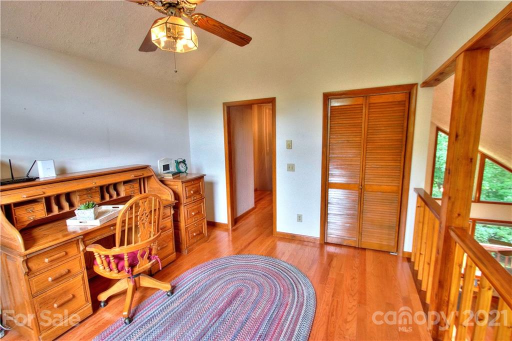 304 Oak Ridge Drive Clyde, NC 28721 - Photo 22 of 31 a view of an entryway with wooden floor