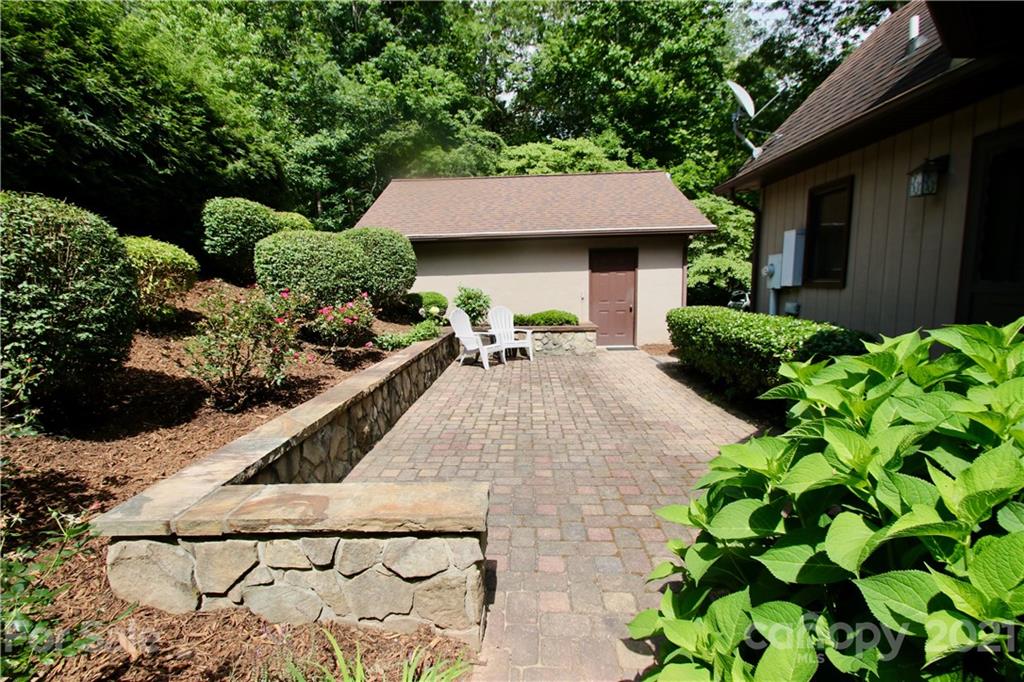 304 Oak Ridge Drive Clyde, NC 28721 - Photo 29 of 31 a front view of a house with a yard