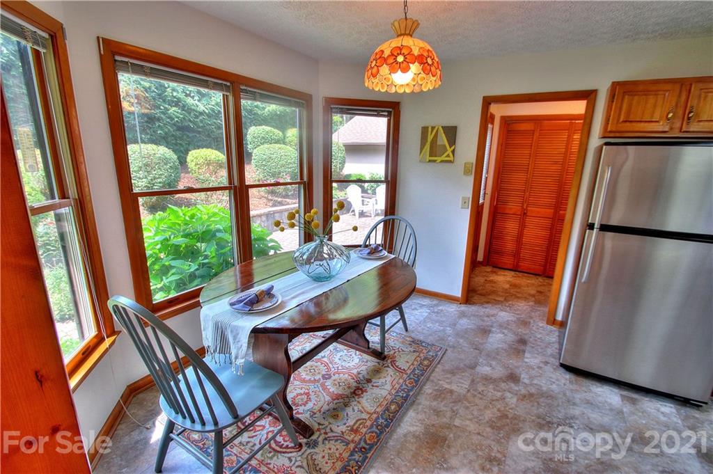304 Oak Ridge Drive Clyde, NC 28721 - Photo 7 of 31 a view of a livingroom with furniture window and wooden floor