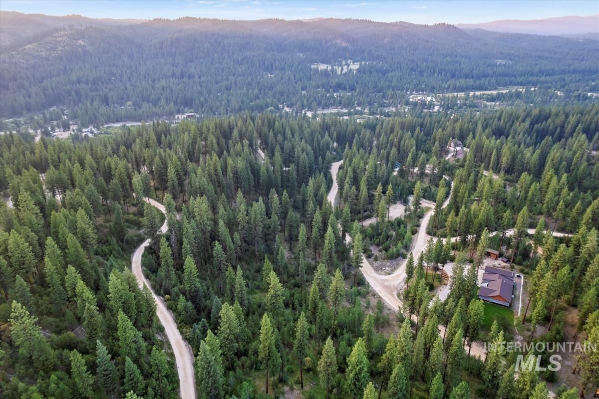Lot 12 Shaw Gulch Road Boise, ID 83716 - Photo 14 of 23 Aerial overview of property's location with a forest and mountains