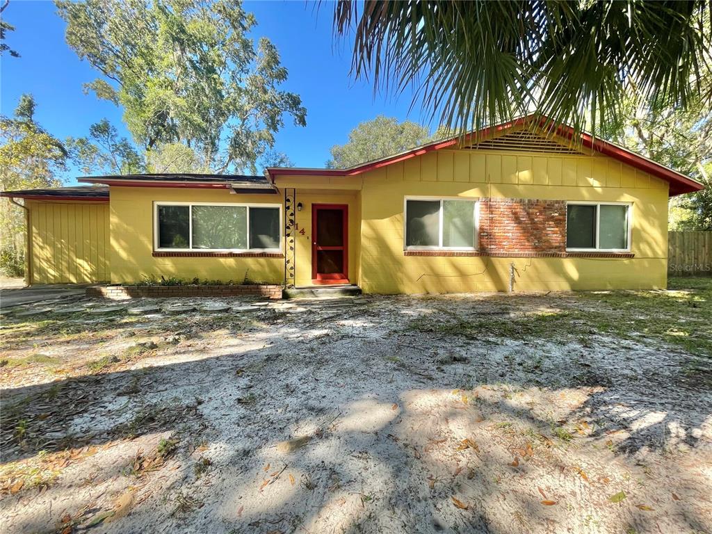314 Northwest 36th Street Gainesville, FL 32607 - Photo 1 of 1 a view of a house with a backyard
