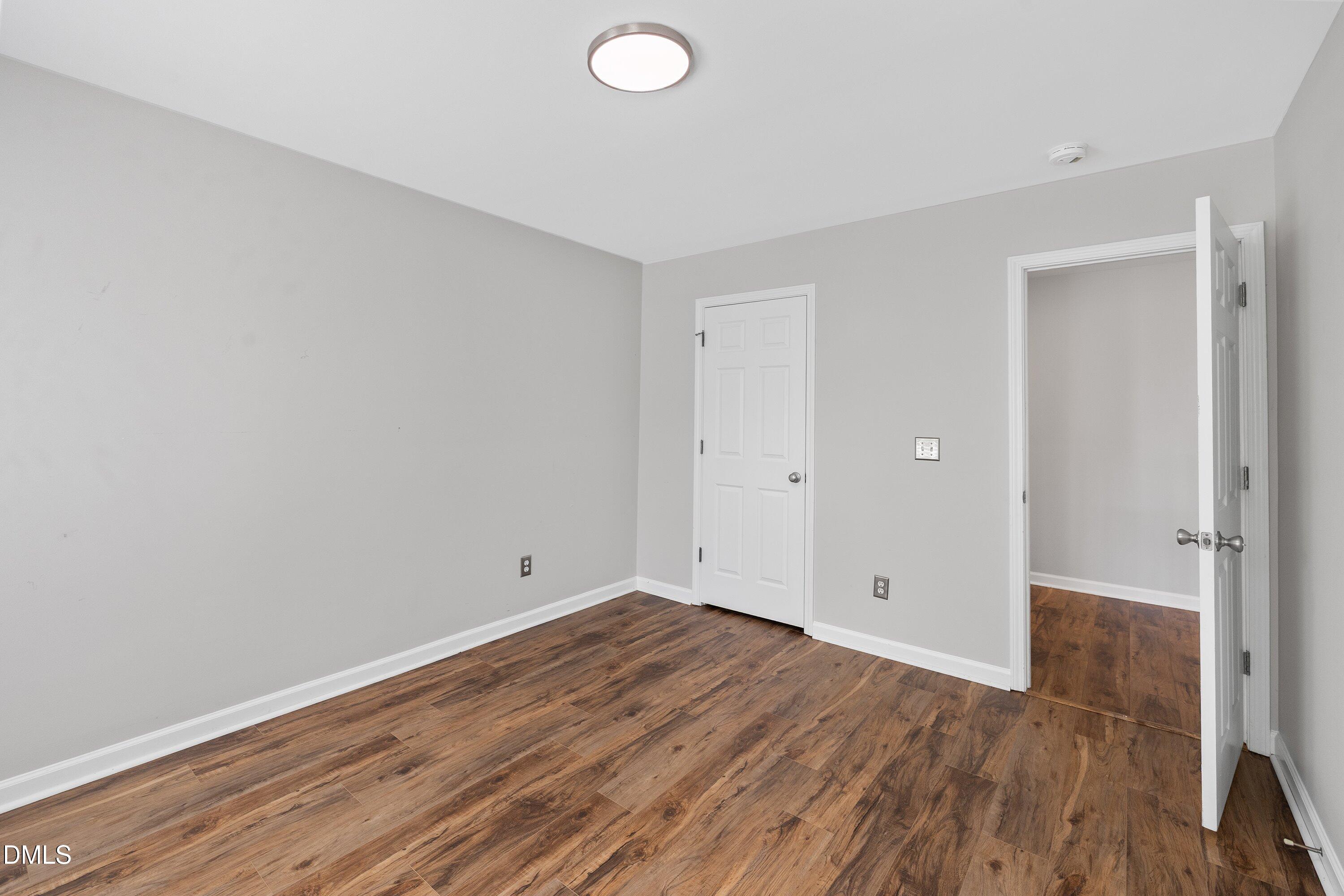 3717 Windmeade Road Wake Forest, NC 27587 - Photo 37 of 51 a view of room with wooden floor