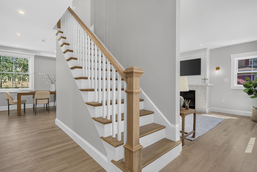 20 Saltonstall Road Medford, MA 02155 - Photo 22 of 41 a view of entryway with wooden floor and stairs