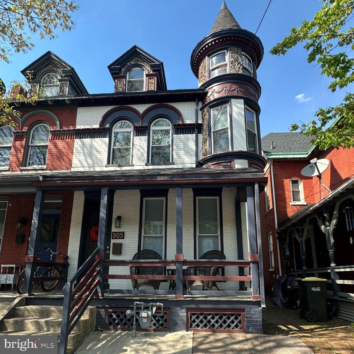 Charming Victorian with turreted elegance.