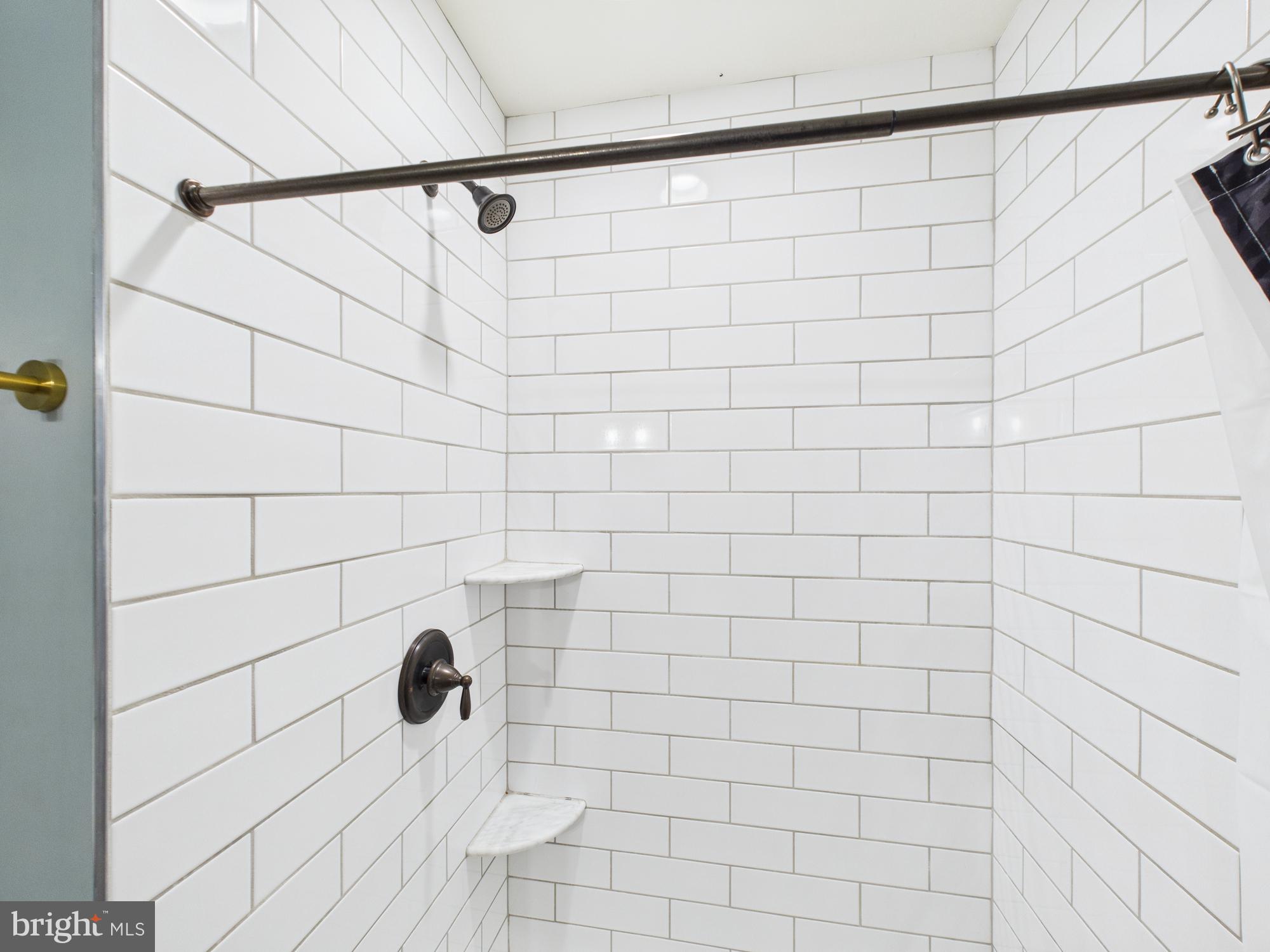 305 West Lemon Street Lancaster, PA 17603 - Photo 21 of 31 Updated Tiled Shower in the Primary Bathroom