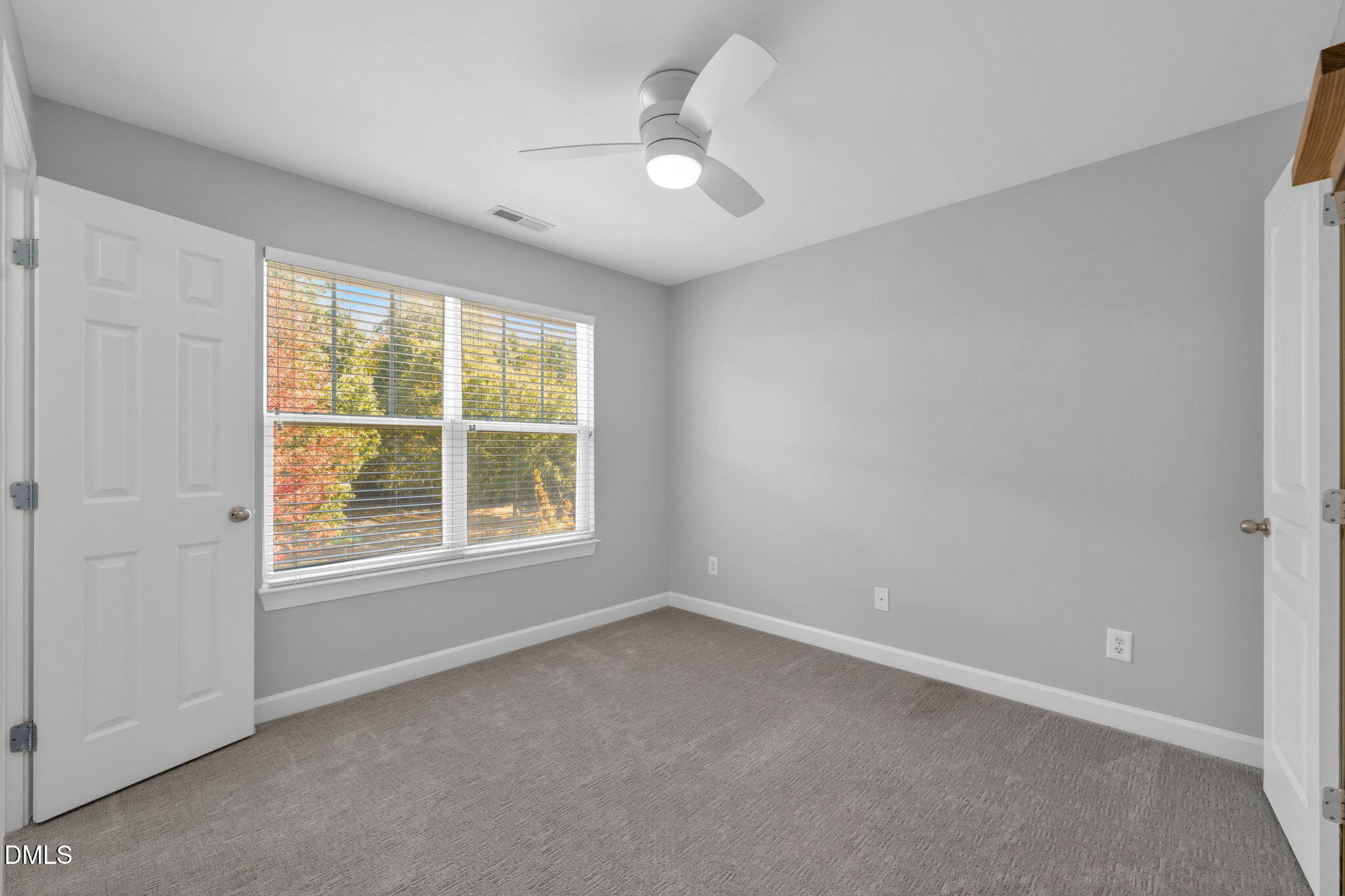 8005 Sycamore Hill Lane Raleigh, NC 27612 - Photo 27 of 31 an empty room with a window