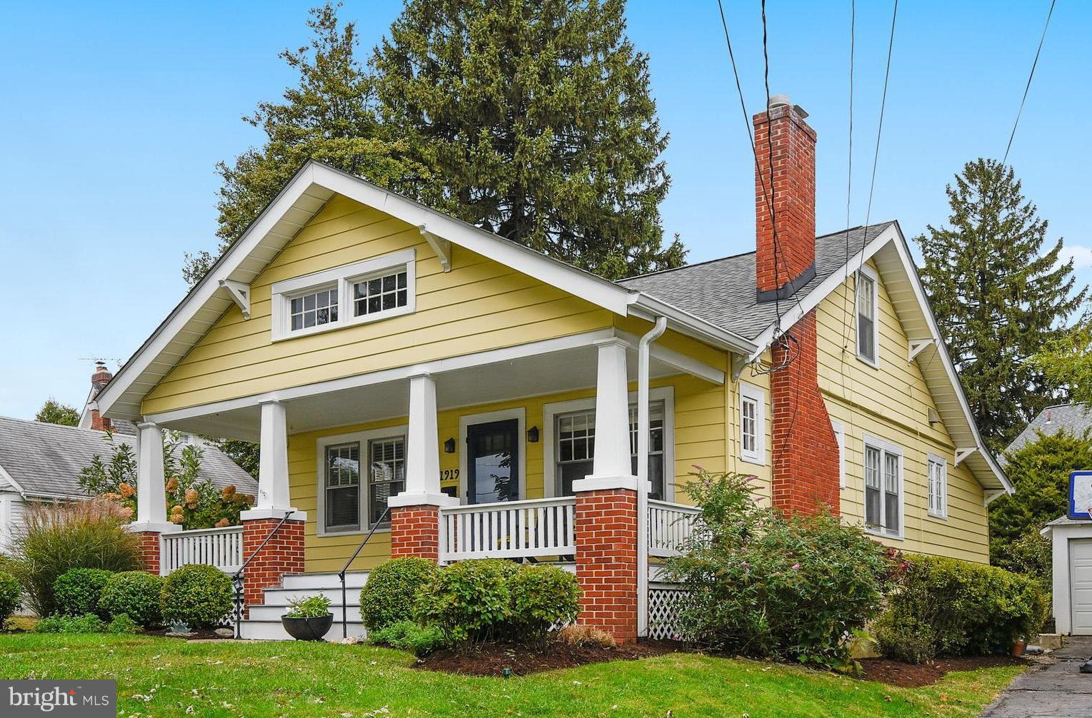 1919 Glen Ross Road Silver Spring, MD 20910 - Photo 2 of 39 a front view of a house with garden