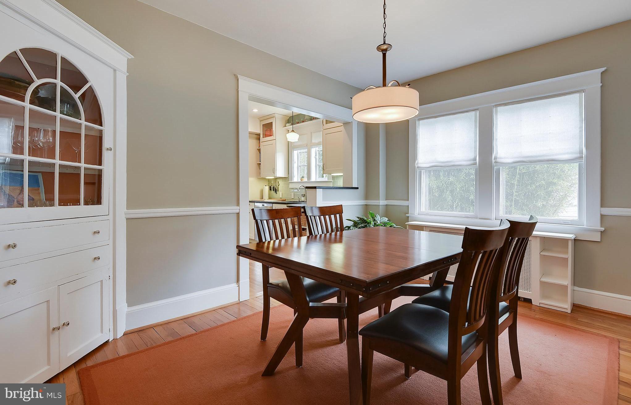 1919 Glen Ross Road Silver Spring, MD 20910 - Photo 11 of 39 a dining room with furniture window and wooden floor