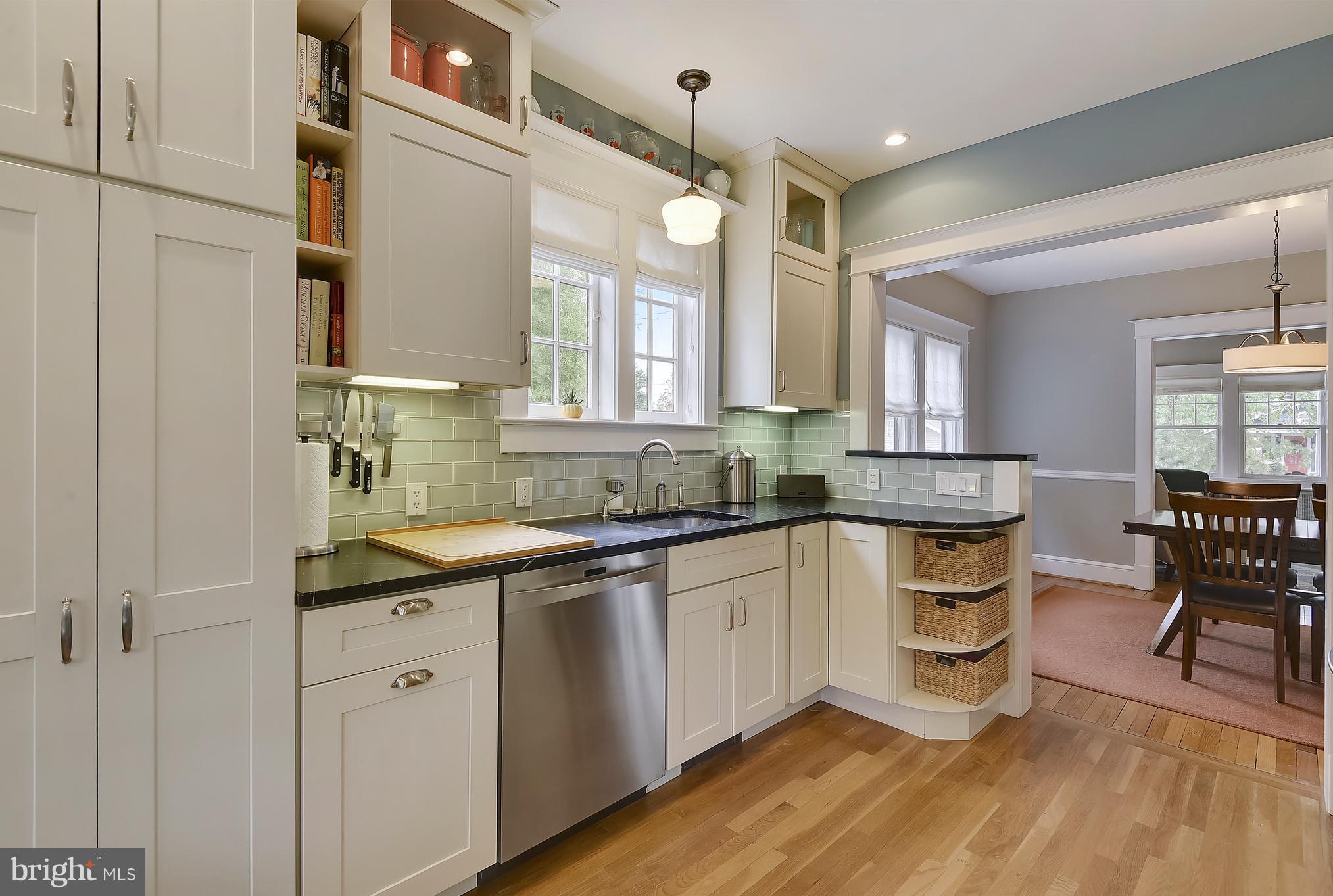 1919 Glen Ross Road Silver Spring, MD 20910 - Photo 13 of 39 a kitchen with a sink cabinets and window
