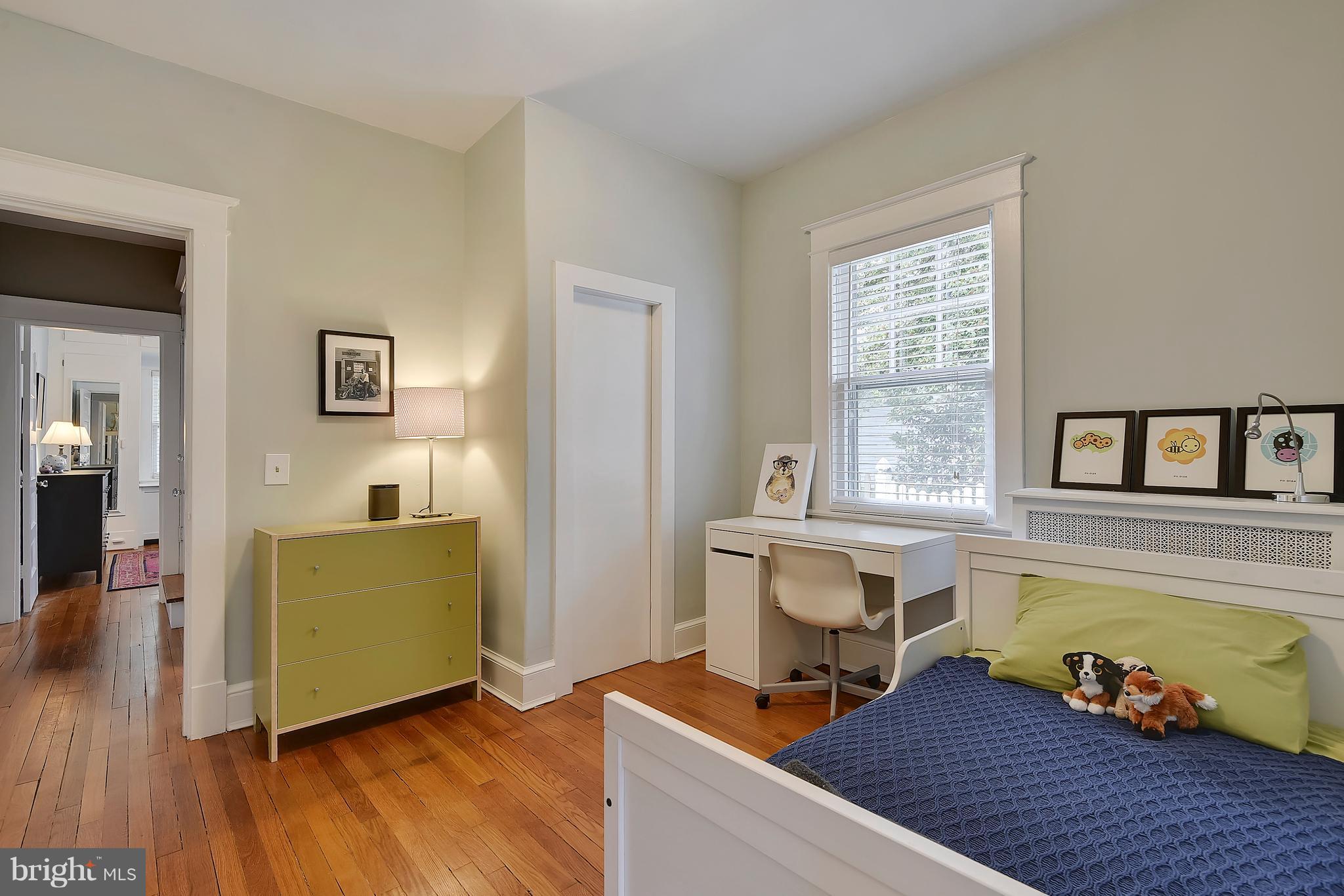 1919 Glen Ross Road Silver Spring, MD 20910 - Photo 21 of 39 a living room with furniture and a wooden floor