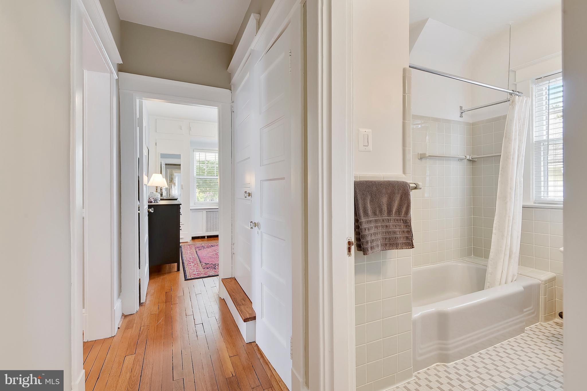 1919 Glen Ross Road Silver Spring, MD 20910 - Photo 22 of 39 a bathroom with a bathtub