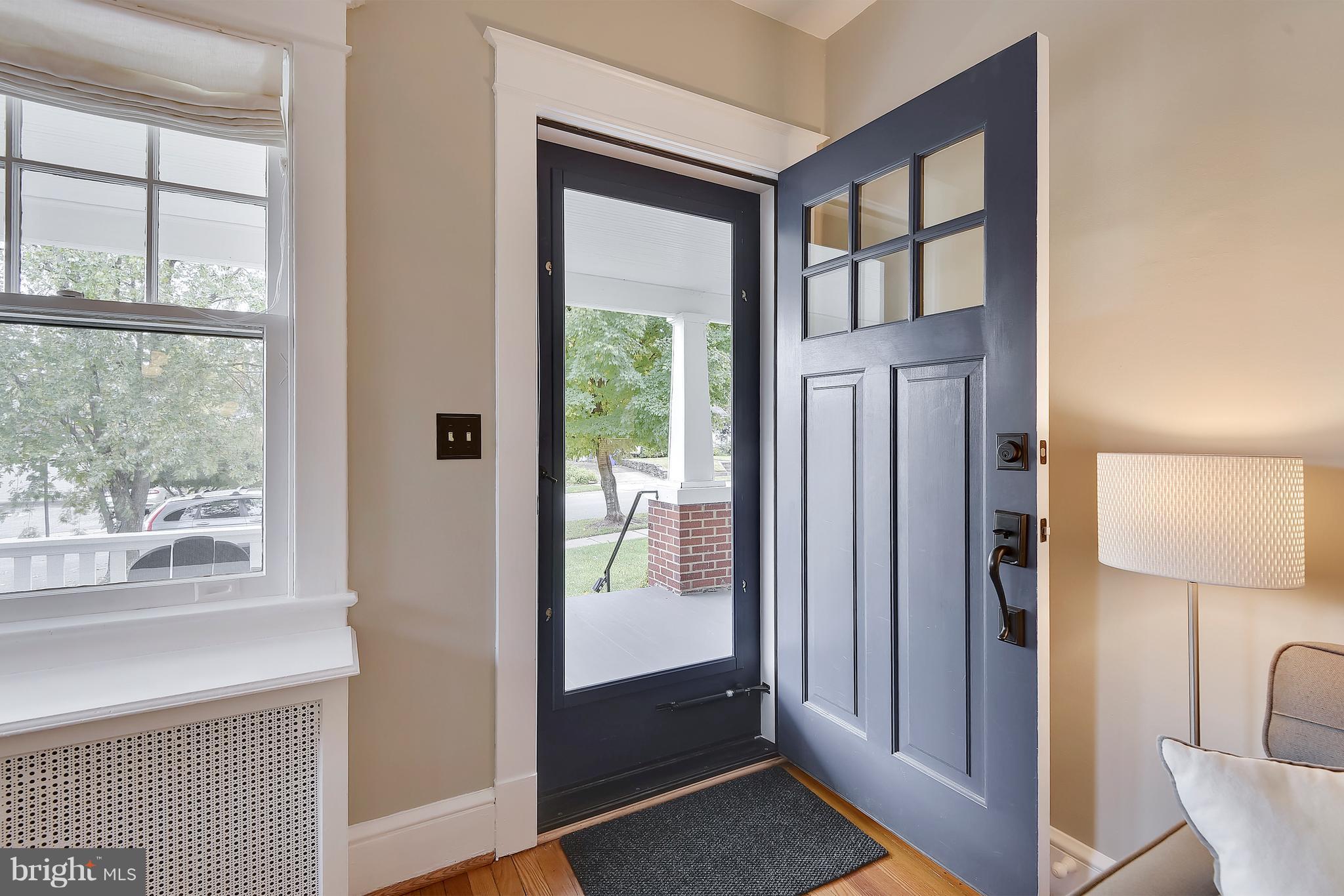 1919 Glen Ross Road Silver Spring, MD 20910 - Photo 6 of 39 a view of front door and bedroom