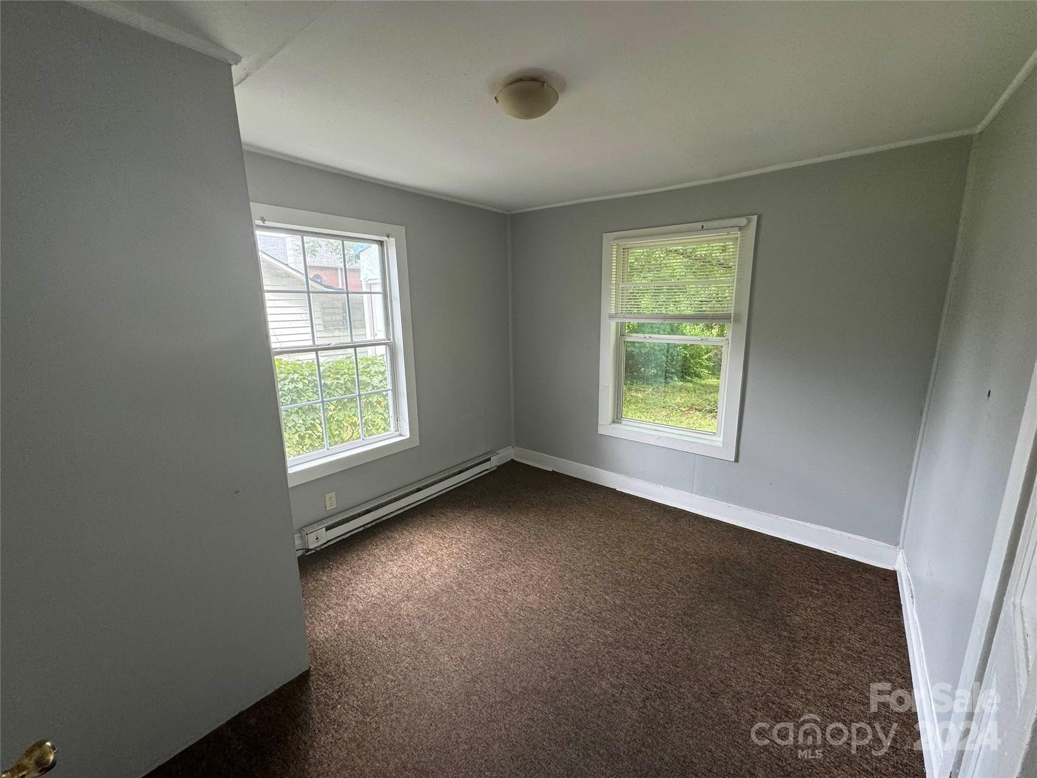 1120 North Ransom Street Gastonia, NC 28052 - Photo 7 of 16 an empty room with a window