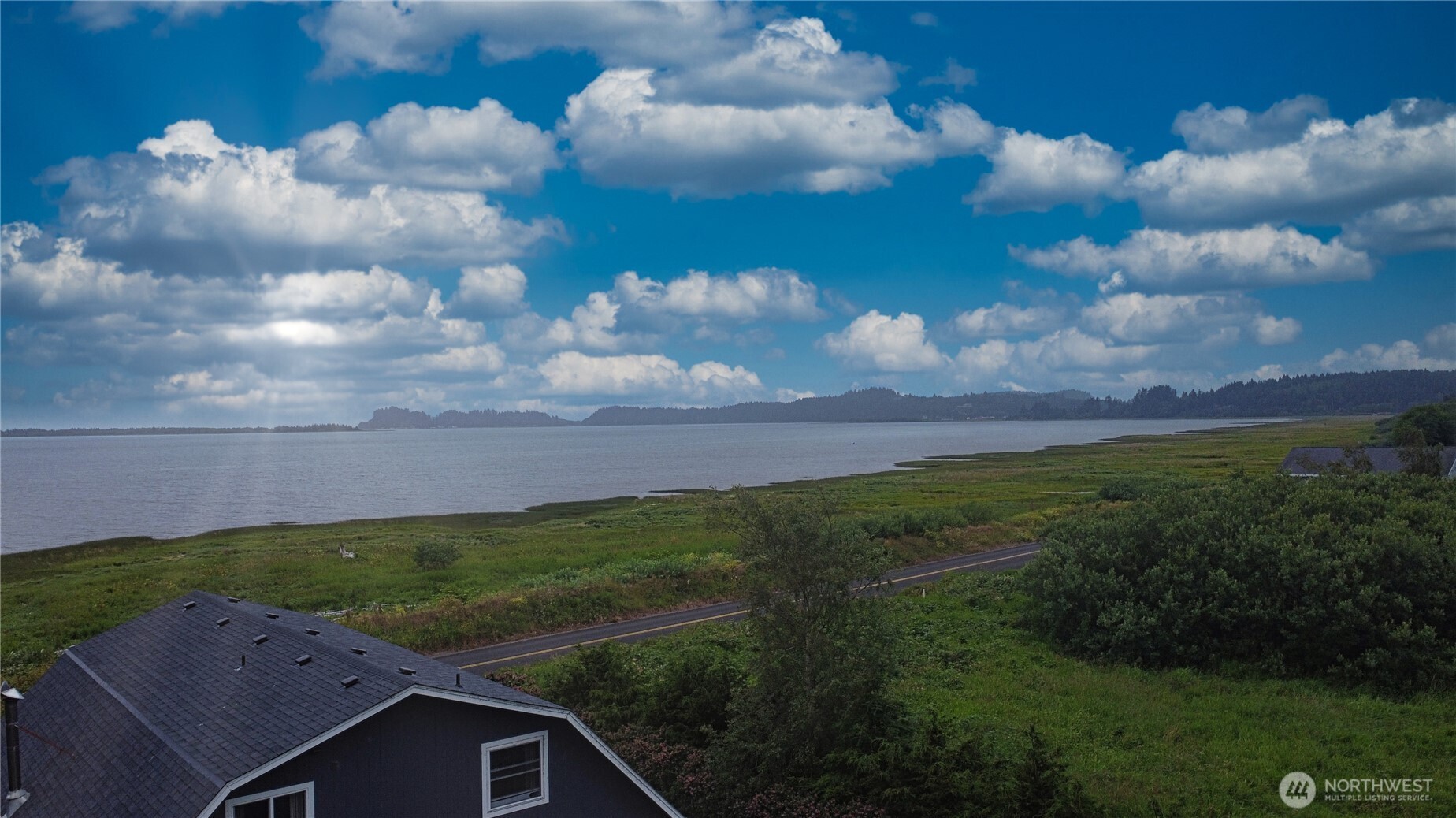 240 Stringtown Road Ilwaco, WA 98624 - Photo 35 of 39 a view of a backyard of the house