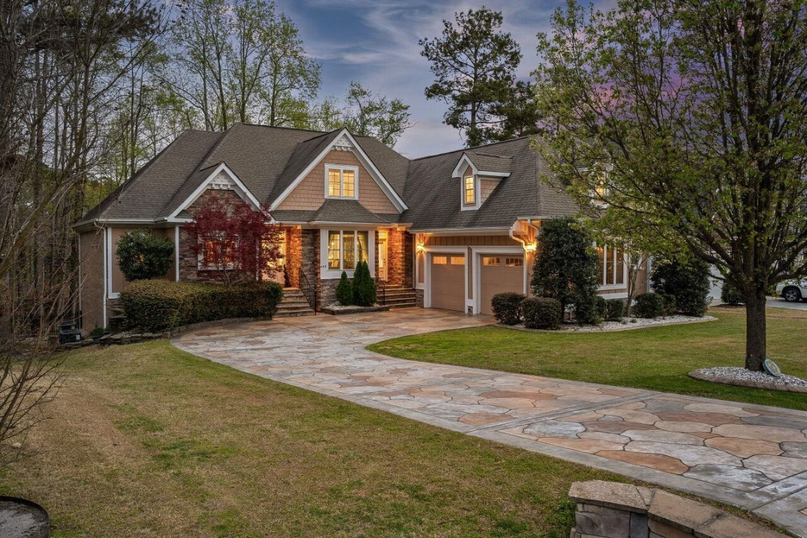 452 Falling Water Road Spring Lake, NC 28390 - Photo 1 of 93 a front view of a house with a yard and garage