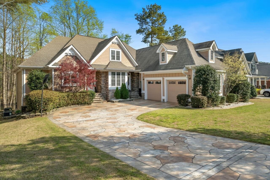 452 Falling Water Road Spring Lake, NC 28390 - Photo 3 of 93 a front view of a house with a garden