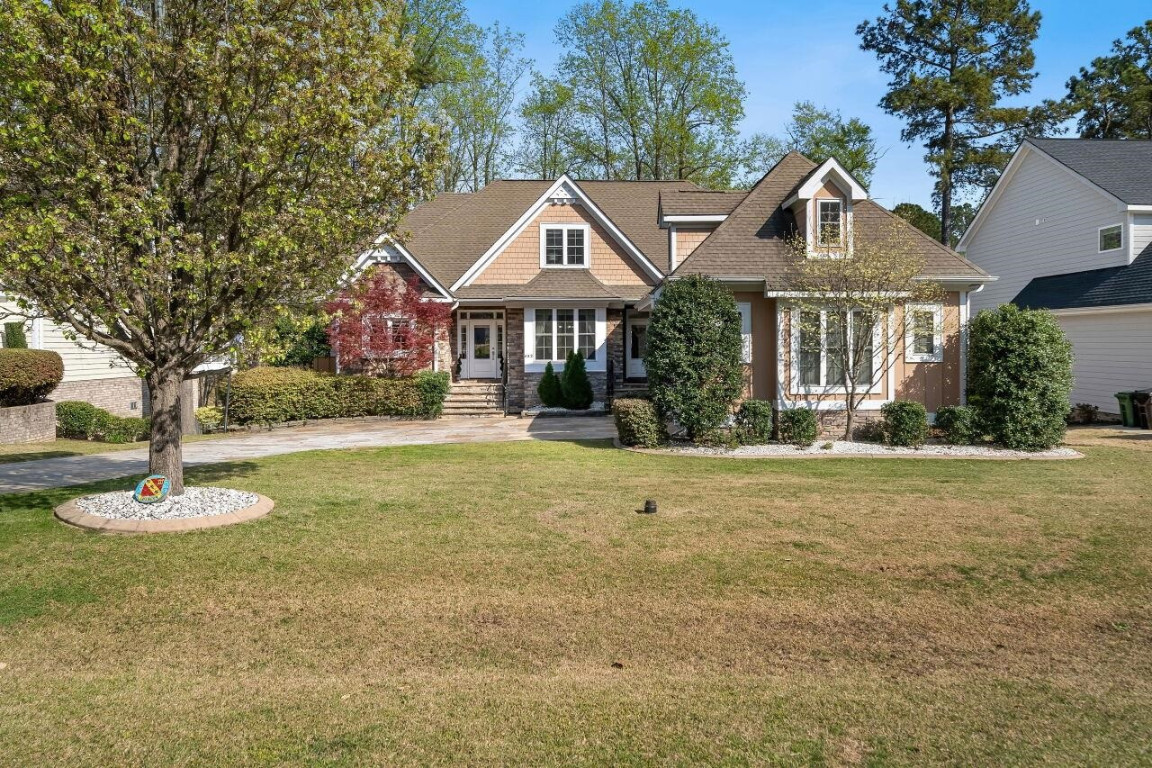 452 Falling Water Road Spring Lake, NC 28390 - Photo 4 of 93 a front view of a house with a garden