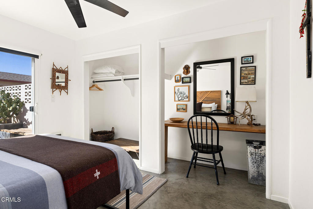 7284 Saddleback Road Joshua Tree, CA 92252 - Photo 20 of 47 a bedroom with a bed and a window